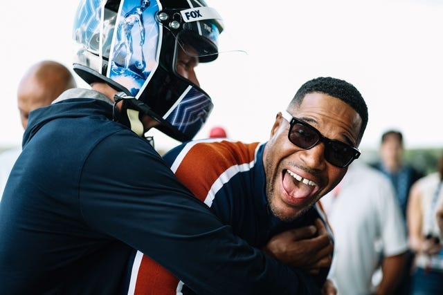 Tom Brady and Michael Strahan